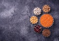 Various legumes. Chickpeas, red lentils, black lentils, yellow p Royalty Free Stock Photo