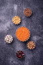 Various legumes. Chickpeas, red lentils, black lentils, yellow p Royalty Free Stock Photo