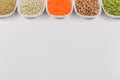 Beans and lentils in bowls on white background Royalty Free Stock Photo