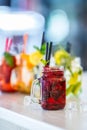 Various lemonades in mason jars with orange lime lemon otange st