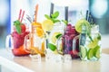 Various lemonades in mason jars with orange lime lemon otange st Royalty Free Stock Photo