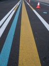 Various lines painted on asphalt