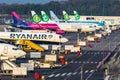 Various low-budget airline aircraft parked at the terminal of Eindhoven-Airport. Eindhoven, The Netherlands - October 25, 2017