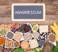 Magnesium food sources, top view on wooden background Royalty Free Stock Photo