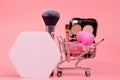 Various make-up products and brushes in shopping cart on pink background. Makeup cosmetics sale concept Royalty Free Stock Photo