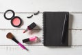 Various make-up products and cosmetics on wooden table Royalty Free Stock Photo