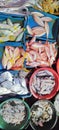 various marine animals sold in the market such as fish, squid and shellfish Royalty Free Stock Photo