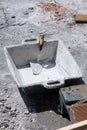 Various masonry and brickwork tools being used on a construction site