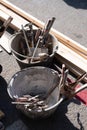 Various masonry and brickwork tools being used on a construction site