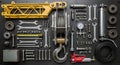 Various mechanical tools and parts are neatly arranged on a dark surface. The centerpiece is a Royalty Free Stock Photo