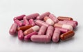 Various medical dosage capsule brown and red Royalty Free Stock Photo