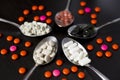 Various medicinal pills, tablets and capsules in spoon Royalty Free Stock Photo