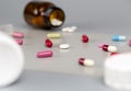 Different medications. Various pill bottles. One-color backdrop. Royalty Free Stock Photo