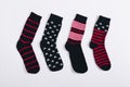 Various men's socks with stripes and stars on a white background