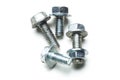 Various metal bolts and nuts displayed on a white surface for hardware analysis Royalty Free Stock Photo
