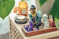 Various minerals and healing crystals on a wooden tray