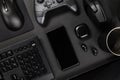 Various modern devices on black table Royalty Free Stock Photo