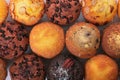 Various muffin cakes in a row top view