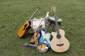 Various musical instruments piled up on the ground Royalty Free Stock Photo