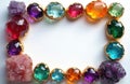 Various natural gemstones in different colors, arranged in frame. Gems includes amethyst, aquamarine, quartz, ruby. Copy space Royalty Free Stock Photo