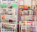 Various newspapers on sale at a newsagent