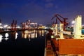 Various night views of the port, piers, terminal and cityline of the Port Qingdao, China, September, 2020.