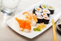 Various of nigiri and hosomaki sushi traditionally served with wasabi and soy sauce Royalty Free Stock Photo