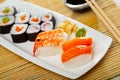 Various of nigiri and hosomaki sushi traditionally served with wasabi and soy sauce Royalty Free Stock Photo