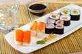 Various of nigiri and hosomaki sushi traditionally served with wasabi and soy sauce Royalty Free Stock Photo