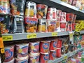 various noodles from various brands and types of noodles displayed on the shelves of a supermarket Royalty Free Stock Photo