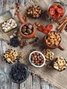 Various nuts and dried fruits - cashew, walnut, pistachios, hazelnuts, dried apricots, raisins Royalty Free Stock Photo