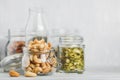 Various nuts and seeds in glass jars Royalty Free Stock Photo