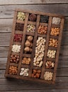 Various nuts in wooden box Royalty Free Stock Photo