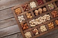 Various nuts in wooden box Royalty Free Stock Photo