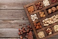 Various nuts in wooden box Royalty Free Stock Photo