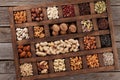 Various nuts in wooden box Royalty Free Stock Photo