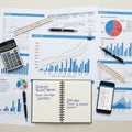 Various office items and documents related to business analysis are arranged Royalty Free Stock Photo