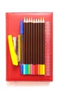 Various office supplies on the book Royalty Free Stock Photo