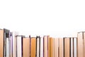 Various old books on a shelf on dark background, banner