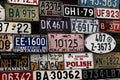 Various old car license plates from around the world at the muse