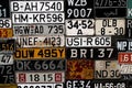 Various old car license plates from around the world at the muse