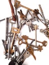 Various old keys, lock picks on a white background