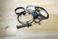 Various old metal clamps for hose connection Royalty Free Stock Photo