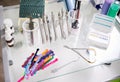 Glass table with dental instruments and orthodontic ligatures. Royalty Free Stock Photo