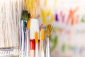 Various paint brushes in the transparent jar Royalty Free Stock Photo