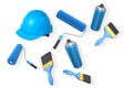 Various painting tools including rollers, brushes, spray cans and hard hat, isolated on white background, concept of painting work Royalty Free Stock Photo
