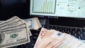 Various paper money banknotes on the table close up. Financial calculations, money and hexagrams.