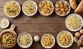 Various pasta, bread and snacks on wooden background Royalty Free Stock Photo