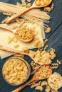 Various pasta on spoons. close up. creative photo.