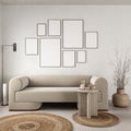 Various picture frames on wall in modern livingroom. Mock up interior in contemporary scandinavian style. Free, copy